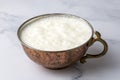 Ayran - Traditional Turkish yoghurt drink in a copper cup Royalty Free Stock Photo