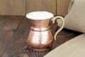 Ayran - Traditional Turkish yoghurt drink in a copper metal cup