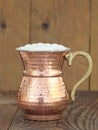 Ayran - Traditional Turkish yoghurt drink in a copper metal cup