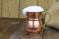 Ayran - Traditional Turkish yoghurt drink in a copper metal cup