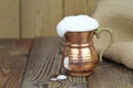 Ayran - Traditional Turkish yoghurt drink in a copper metal cup