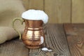 Ayran - Traditional Turkish yoghurt drink in a copper metal cup