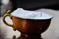 Ayran - Traditional Turkish yoghurt drink in a copper metal cup