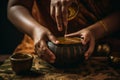 An Ayurvedic abhyanga massage in progress, showing hands rhythmically prepare herbal oils to a warm skin. Capture the rejuvenating