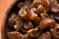 Ayurvedic Amla Candy, which is dried and salty-sweet or chatpata in taste and digestive. Served in a wooden bowl, selective focus Royalty Free Stock Photo