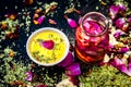 Ayurvedic face pack of dried grounded leaves of Indian iliac or neem with gram flour and rose water with some rose petals on woode