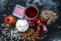 Ayurvedic face pack of pomegranate with some crushed almonds and its oil,rice flour, to cure wrinkles. On wooden surface With raw Royalty Free Stock Photo