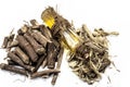Famous Herb Licorice Root Or Liquorice Root Or Mulethi Root Isolated On White Along With Its Essential Oil.