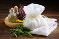 ayurvedic herbs tied in cheesecloth for herbal compress