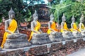 Ayuthaya, Thailand - 13 February 2014: Rows of buddha statue Wat Yai Chaimongkhon