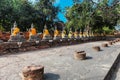 Ayuthaya, Thailand - 13 February 2014: Rows of buddha statue Wat Yai Chaimongkhon