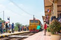 State Railway of Thailand Diesel electric Alstom locomotive 4144 hauls a train in Ayutthaya Railway station, Ayutthaya, Thailand