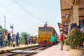 State Railway of Thailand Diesel electric Alstom locomotive 4144 hauls a train in Ayutthaya Railway station, Ayutthaya, Thailand