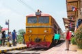 State Railway of Thailand Diesel electric Alstom locomotive 4144 hauls a train in Ayutthaya Railway station, Ayutthaya, Thailand