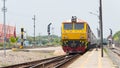 State Railway of Thailand Diesel electric locomotive 4226 hauls a train in Ayutthaya Railway station, Ayutthaya, Thailand