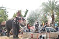 elephant splashing water between tourist in Songkarn festival