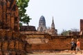 Ayutthaya , Thailand - April 15, 2016 : Tourist travel a archaeological site at Wat Mahathat temple Royalty Free Stock Photo