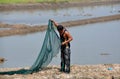 Ayutthaya, Thailand: Fisherman with Net