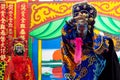 Ayutthaya, Thailand - June 30, 2020 : Unidentified Chinese opera actors performs traditional drama and shows mark face-changing