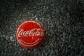 Ayutthaya, Thailand-25June2020: Coca-Cola Classic in a glass bottle and can on dark toned cement Background. Coca Cola, Coke is th Royalty Free Stock Photo