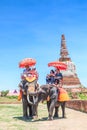 AYUTTHAYA, THAILAND - JUNE 1: Tourists on an elephant ride tour Royalty Free Stock Photo