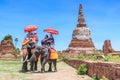 AYUTTHAYA, THAILAND - JUNE 1: Tourists on an elephant ride tour Royalty Free Stock Photo