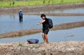 Ayutthaya, Thailand: Woman with Basket Fishing