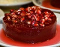 Ayva Tatlisi, Quince in Syrup, Topped with Nuts and Cream Cheese. Traditional Turkish Dessert