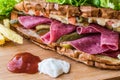 Ayvalik Toast / Salami Sandwich with Russian Salad, pickle and potatoes Royalty Free Stock Photo