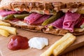 Ayvalik Toast / Salami Sandwich with Russian Salad, pickle and potatoes Royalty Free Stock Photo