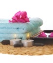 Azalea,candle and blue towel on mat Royalty Free Stock Photo