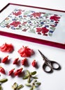 Azalea flowers and buds prepared for the pressed against the background of a botanical picture, a herbarium of dried