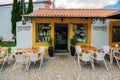 Shopfront selling local products such as cake, cheese and wine built in traditional Portuguese architecture in the