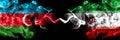 Azerbaijan, Azerbaijani vs Iran, Iranian smoky mystic flags placed side by side. Thick colored silky abstract smoke flags