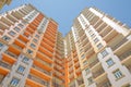 Facade of modern multi-storey new residential orange building near BAku . New apartment house . Storey houses modern Royalty Free Stock Photo