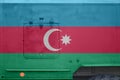 Azerbaijan flag depicted on side part of military armored truck closeup. Army forces conceptual background