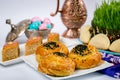Azerbaijani national, festive treats: Xiamen, pastries, shekerburas, walnuts, hazelnuts, white sugar with nuts, black raisins. Royalty Free Stock Photo