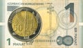 50 azerbaijani qepik coin against 1 azerbaijani manat bank note Royalty Free Stock Photo