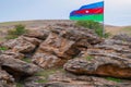 Azerbaijanian Flag in rocky Mountain Landscape, Azerbaijan