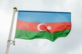 Flag of Azerbaidjan waving in the wind ablazed Royalty Free Stock Photo
