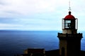 Azorean Lighthouse overlooking the blue ocean Royalty Free Stock Photo