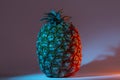 Azorean Pineapple in neon light on dark background. Close-up. Pineapple (Ananas) fruit from Azores