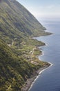 Azores coastline landscape with village in Sao Jorge island. Por