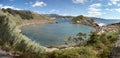 Azores coastline landscape with volcanic island. Ilheu da Vila. Royalty Free Stock Photo