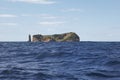 Azores coastline landscape with volcanic island. Ilheu da Vila.