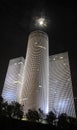 Azrieli Towers in Tel Aviv at night with moon Royalty Free Stock Photo