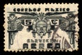 Aztec mask and headdress on an old mexican stamp Royalty Free Stock Photo