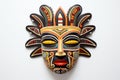 Aztec traditional, ceremonial mask on white background. Warrior mask. Tribal totem. Aztec-inspired mask showcasing Royalty Free Stock Photo