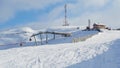 Upper gondola station at Azuga ski resort, Romania - view from the ski slope in Winter