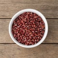 Azuki beans in a bowl over wooden table Royalty Free Stock Photo